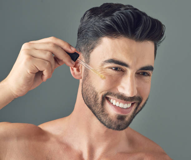 applying cbd wellness face serum